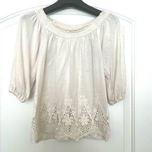 White strapless top.